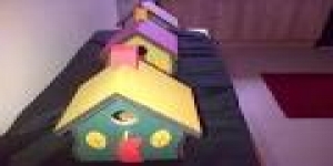 Multi Coloured Bird Boxes And Feeders